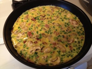 Add it all together and follow a real recipes directions.  Basically move it about until the whole bottom is tight, then transfer to a 400 degree oven for about 15 - 20 minutes.